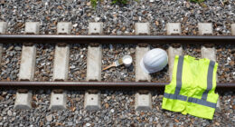 Painting The Sides Of Railroad Rails White To Reduce Derailment